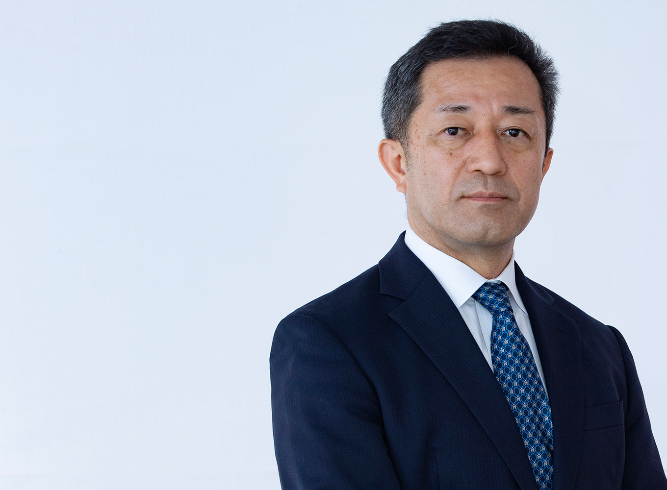 Yoshiaki Tanaka Chairman